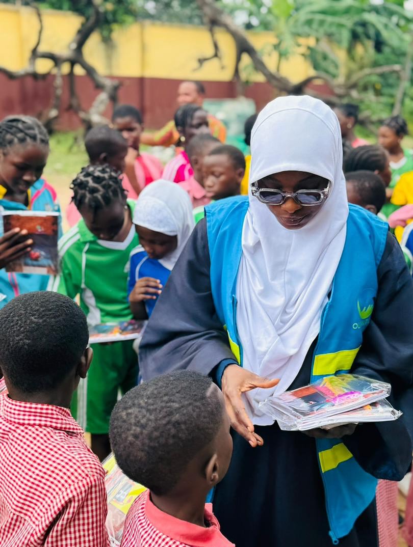 Smiling children framed inside a Nigeria map shape